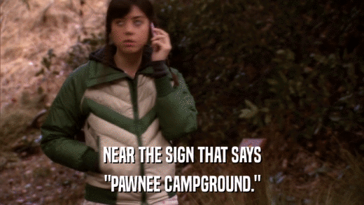 NEAR THE SIGN THAT SAYS 
