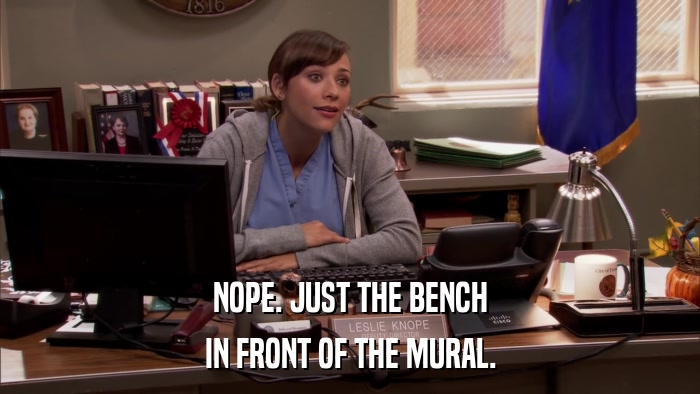 NOPE. JUST THE BENCH IN FRONT OF THE MURAL. 