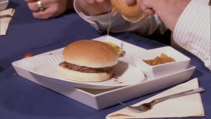 HERE'S MINE. IT'S A HAMBURGER, MADE OUT OF MEAT, ON A BUN, WITH NOTHING. 