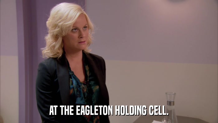 AT THE EAGLETON HOLDING CELL.  