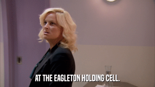 AT THE EAGLETON HOLDING CELL.  