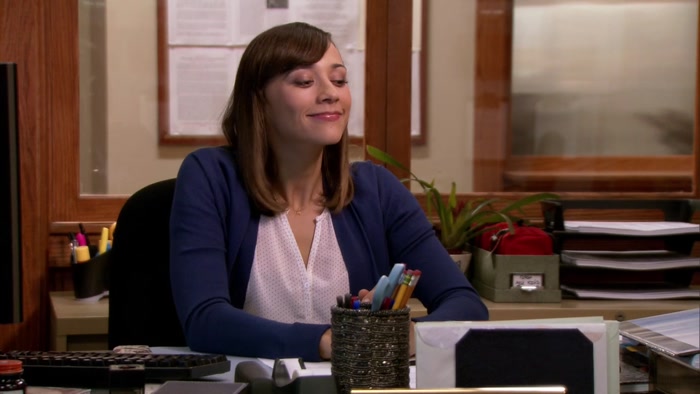 MMM-HMM. LESLIE'S BUSY, SHE'S WORKING ON 