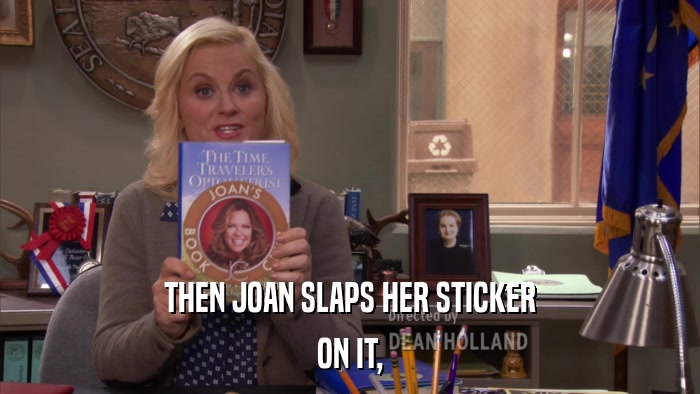THEN JOAN SLAPS HER STICKER ON IT, 
