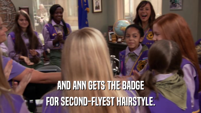 AND ANN GETS THE BADGE FOR SECOND-FLYEST HAIRSTYLE. 