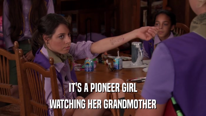 IT'S A PIONEER GIRL WATCHING HER GRANDMOTHER 