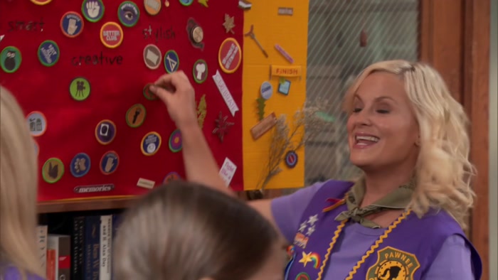 AND ANN GETS THE BADGE FOR SECOND-FLYEST HAIRSTYLE. 