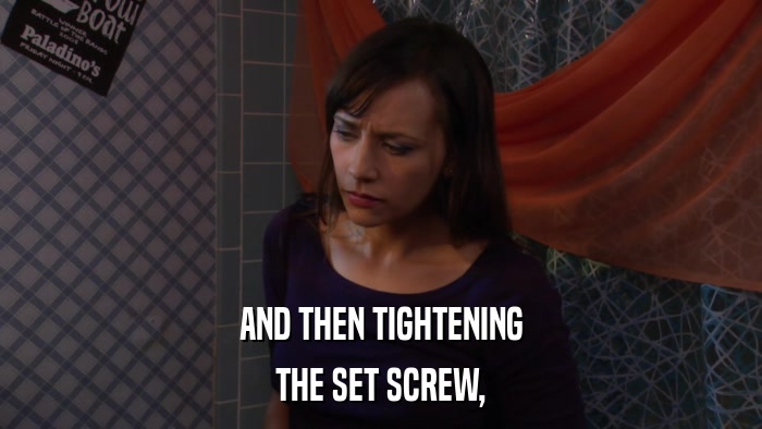 AND THEN TIGHTENING THE SET SCREW, 