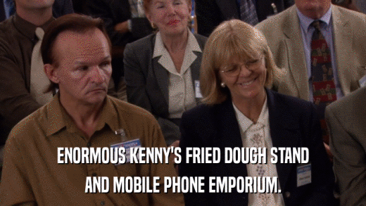 ENORMOUS KENNY'S FRIED DOUGH STAND AND MOBILE PHONE EMPORIUM. 