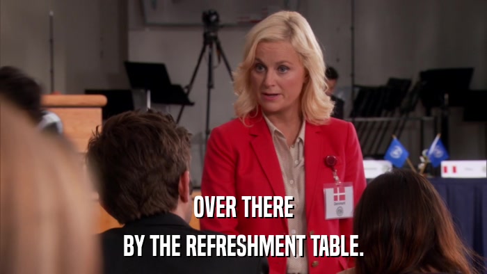 OVER THERE BY THE REFRESHMENT TABLE. 