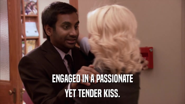 ENGAGED IN A PASSIONATE YET TENDER KISS. 