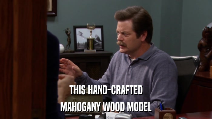 THIS HAND-CRAFTED MAHOGANY WOOD MODEL 