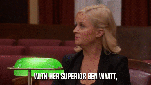 WITH HER SUPERIOR BEN WYATT,  
