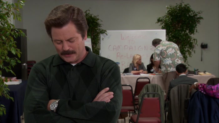 LESLIE WANTED TO HIRE A CONTRACTOR TO BUILD A STAGE. 