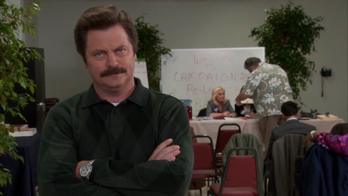 LESLIE WANTED TO HIRE A CONTRACTOR TO BUILD A STAGE. 