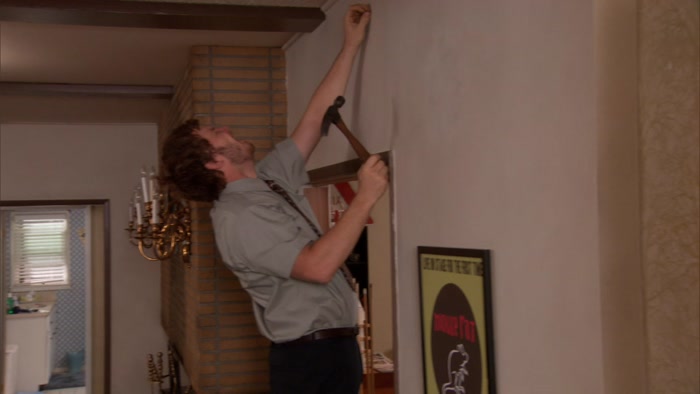 YEAH, HE WAS HANGING UP HIS GOLD RECORD. 