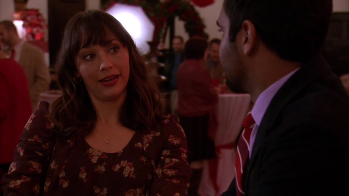 WE'RE STUCK AT A PARKS AND REC COMMUNITY COUPLES EVENT. 