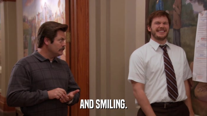 AND SMILING.  