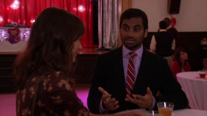 WE'RE STUCK AT A PARKS AND REC COMMUNITY COUPLES EVENT. 
