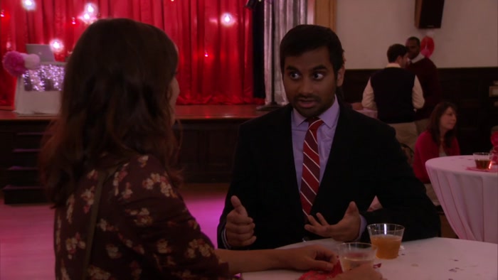 WE'RE STUCK AT A PARKS AND REC COMMUNITY COUPLES EVENT. 