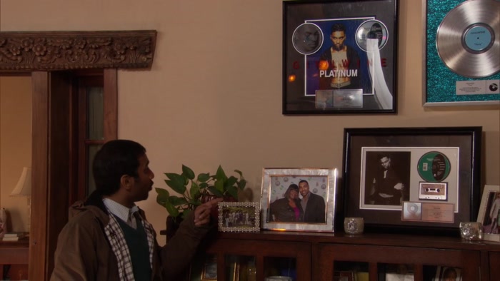 WHY DO YOU HAVE A PHOTO OF YOU WITH GINUWINE AT SOME PLACE? 