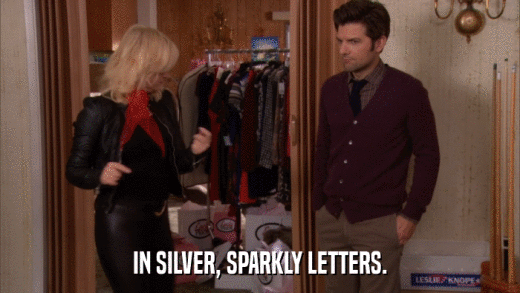 IN SILVER, SPARKLY LETTERS.  