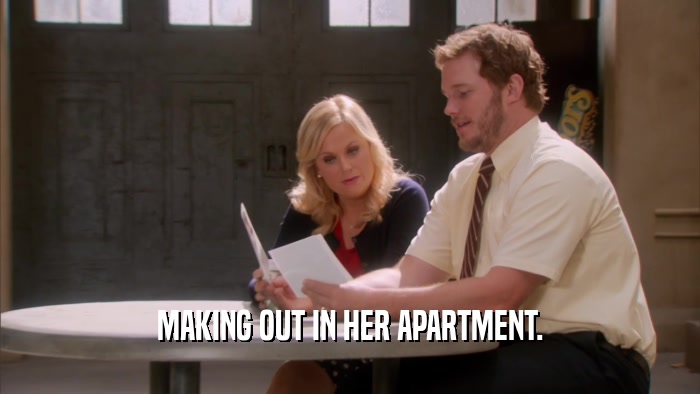 MAKING OUT IN HER APARTMENT.  