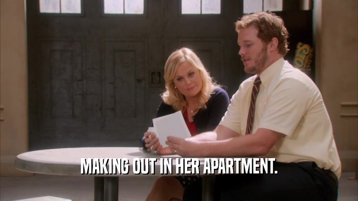 MAKING OUT IN HER APARTMENT.  