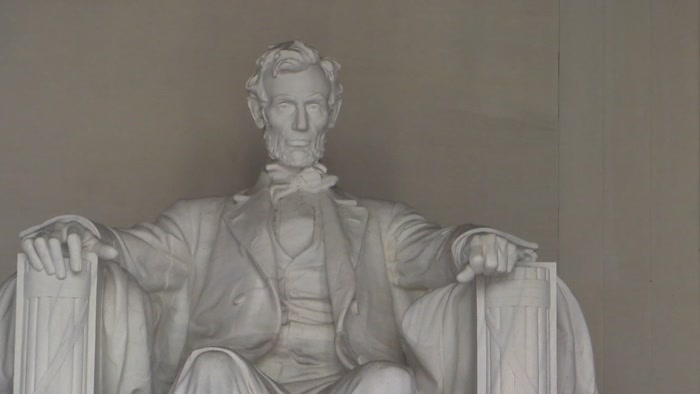 THE MEMORY OF ABRAHAM
 LINCOLN IS ENSHRINED FOREVER.