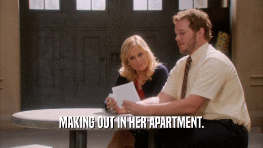 MAKING OUT IN HER APARTMENT.  