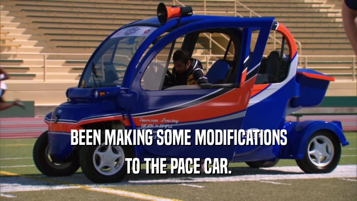 BEEN MAKING SOME MODIFICATIONS TO THE PACE CAR. 