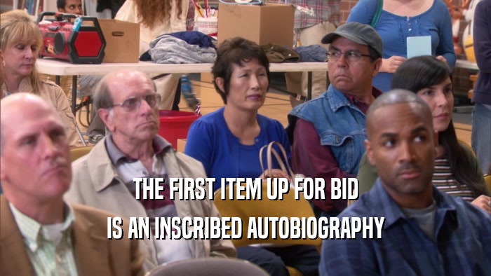 THE FIRST ITEM UP FOR BID IS AN INSCRIBED AUTOBIOGRAPHY 