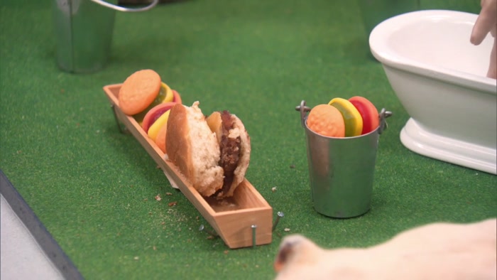 WE ALSO HAVE FOOD TROUGHS FULL OF CHEESEBURGERS 