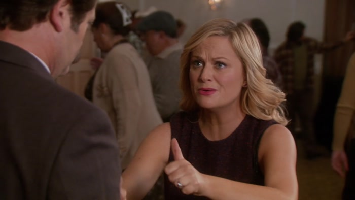 SHE IS AT THE BAR RIGHT NOW ORDERING A LAGAVULIN, NEAT 