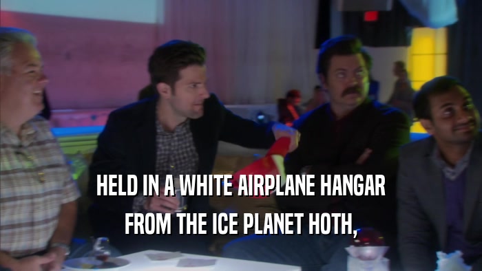 HELD IN A WHITE AIRPLANE HANGAR FROM THE ICE PLANET HOTH, 
