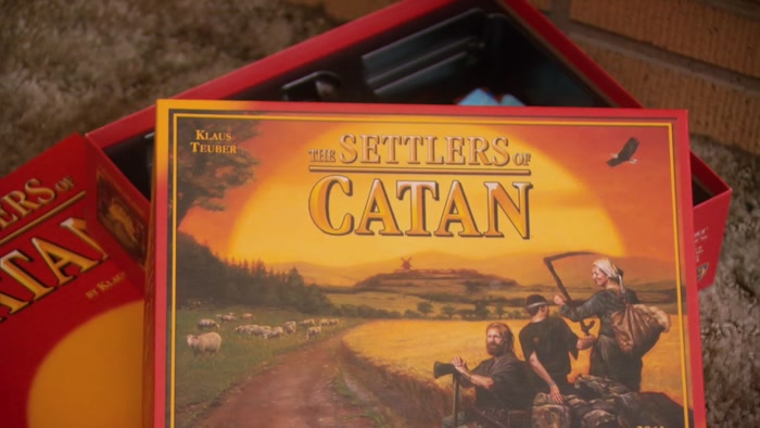 THE GAME IS SETTLERS OF CATAN.  