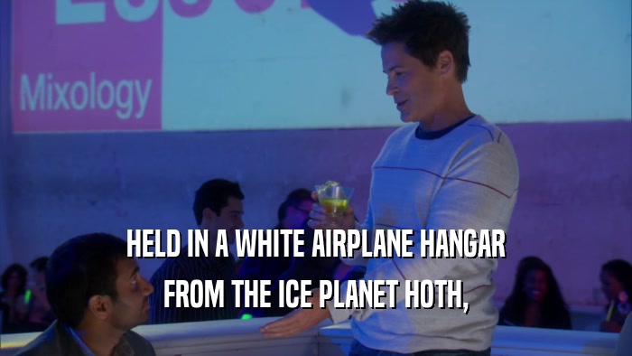 HELD IN A WHITE AIRPLANE HANGAR FROM THE ICE PLANET HOTH, 