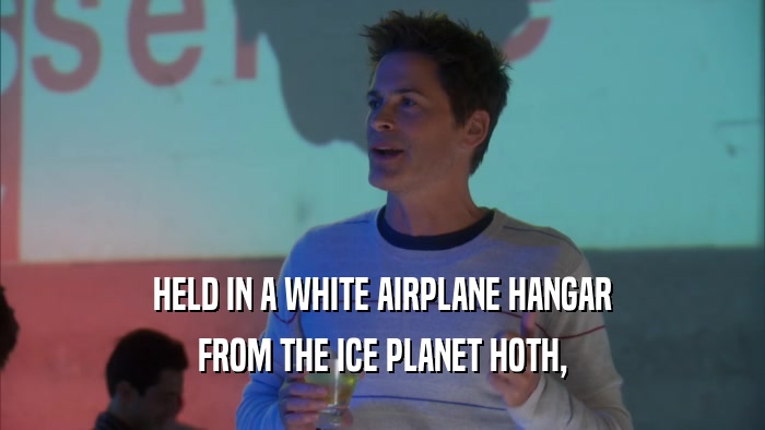 HELD IN A WHITE AIRPLANE HANGAR FROM THE ICE PLANET HOTH, 