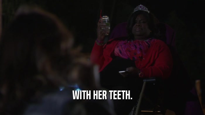 WITH HER TEETH.  