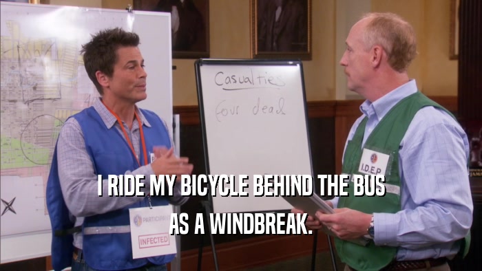 I RIDE MY BICYCLE BEHIND THE BUS AS A WINDBREAK. 