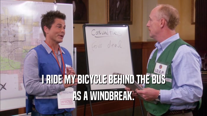 I RIDE MY BICYCLE BEHIND THE BUS AS A WINDBREAK. 
