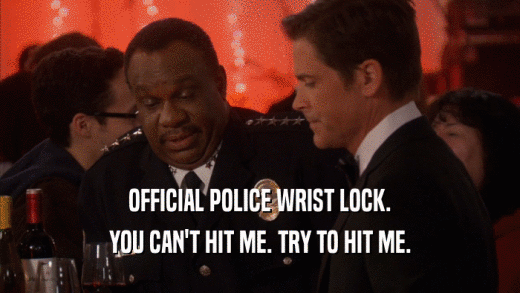 OFFICIAL POLICE WRIST LOCK. YOU CAN'T HIT ME. TRY TO HIT ME. 