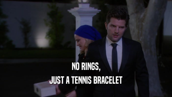 NO RINGS, JUST A TENNIS BRACELET 