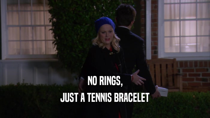 NO RINGS, JUST A TENNIS BRACELET 