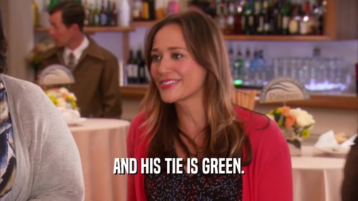 AND HIS TIE IS GREEN.  