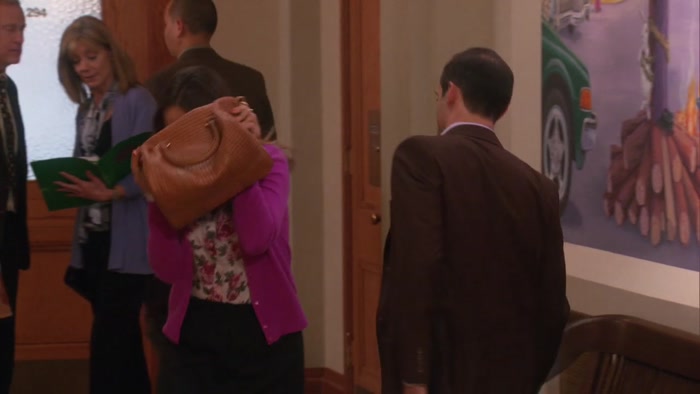 ANN PERKINS, I SEE YOU BEHIND THAT ATTRACTIVE PURSE. 