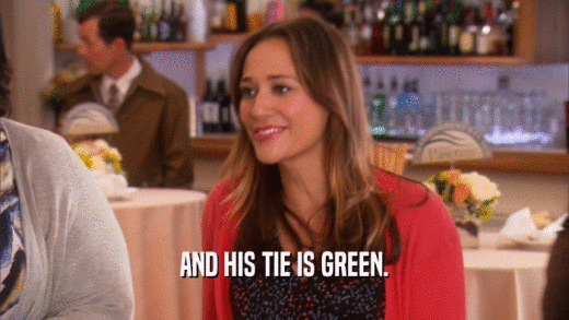 AND HIS TIE IS GREEN.  