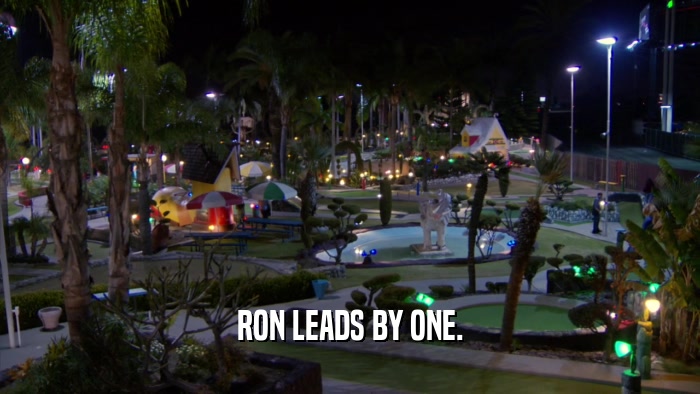 RON LEADS BY ONE.  