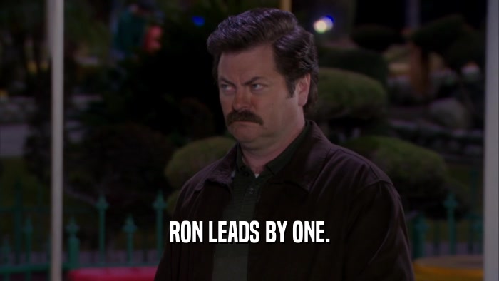 RON LEADS BY ONE.  