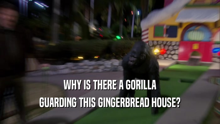 WHY IS THERE A GORILLA GUARDING THIS GINGERBREAD HOUSE? 