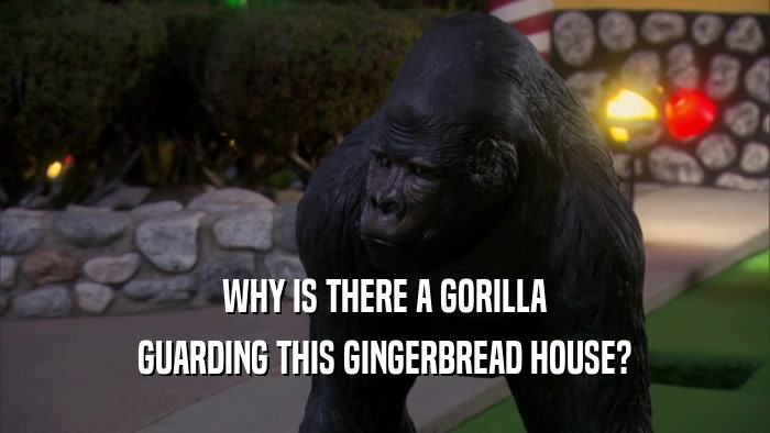 WHY IS THERE A GORILLA GUARDING THIS GINGERBREAD HOUSE? 